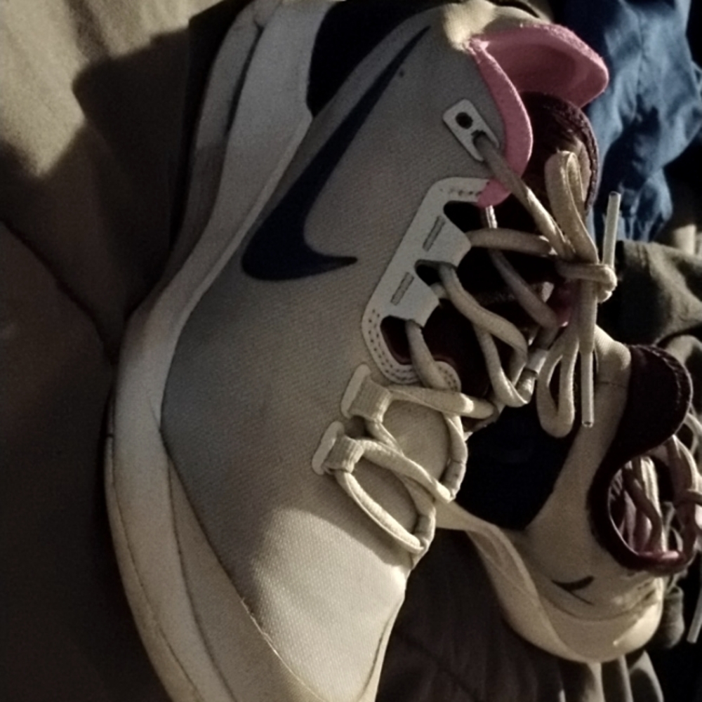 Pinky and Sliver Nike athletic size 6 shoes